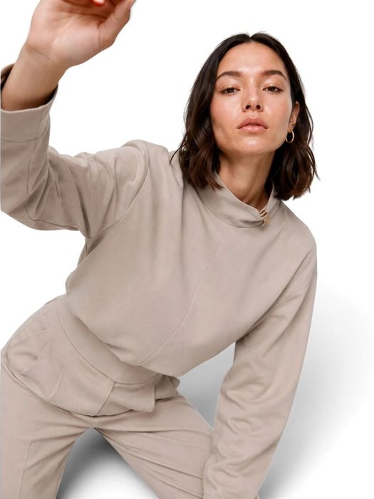 Ecrukleurige blouse met detail aan de kraag Pius Kocca