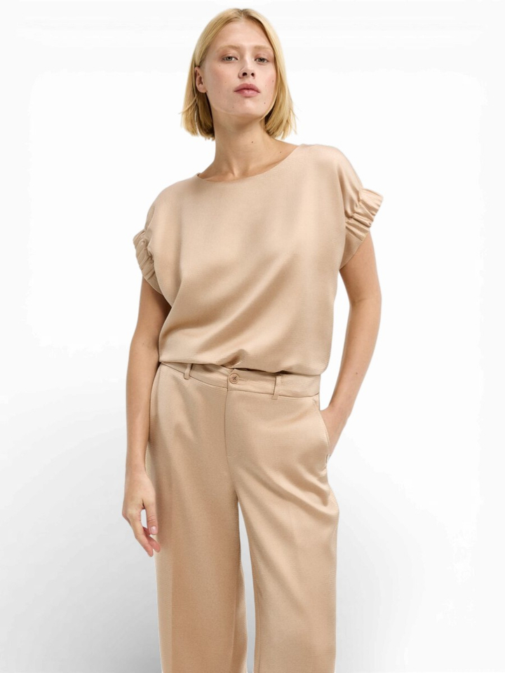 Goudkleurige blouse met detail op de mouw Hosna Xandres