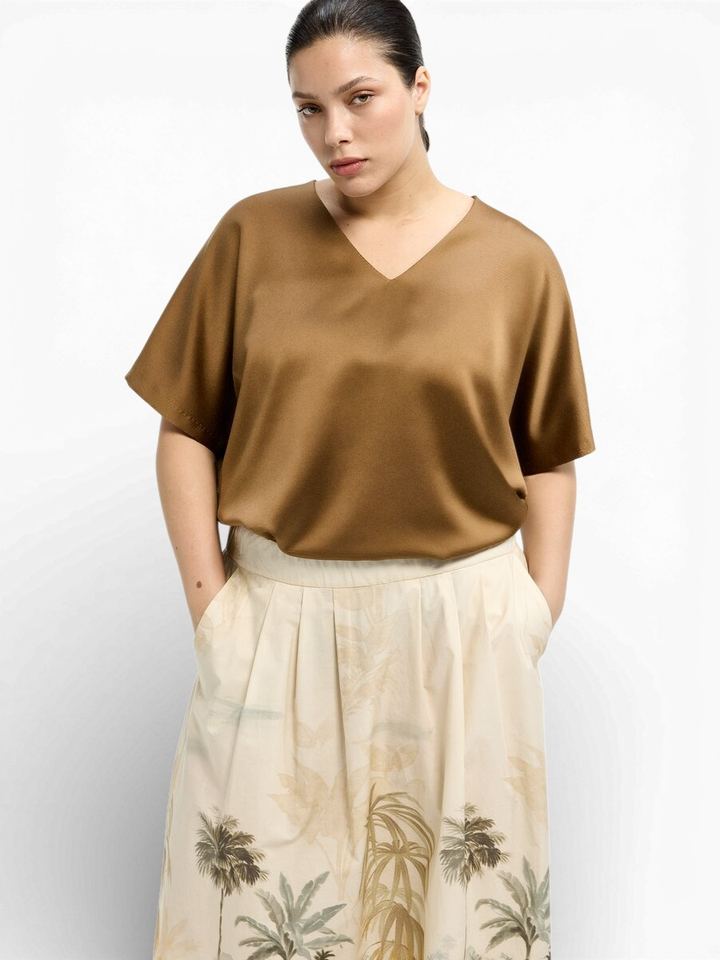 Beige uitlopende rok met zakken en print Rolo Xandres 