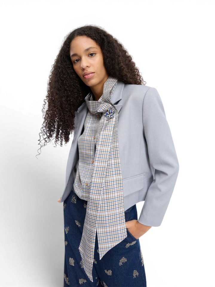 Bloes met strik in beige/blauw ruit motief Veiling Munthe