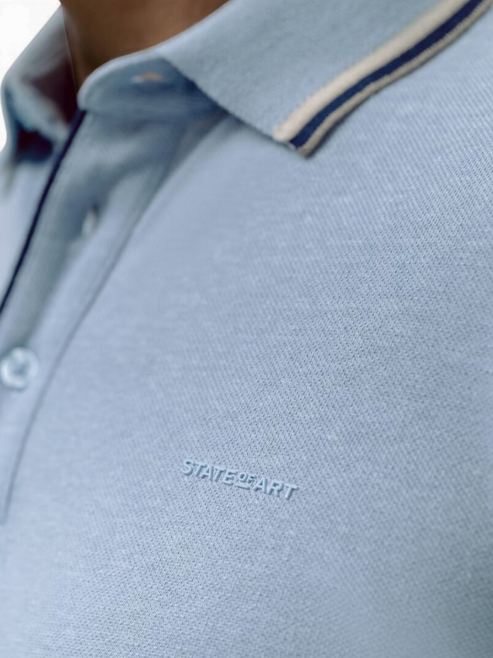 Lichtblauwe polo State Of Art 