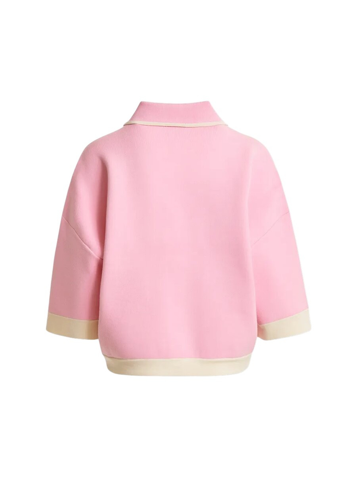 Roze gebreid vest met bloemknopen en contrasterende off-white randen Jugly Essentiel 