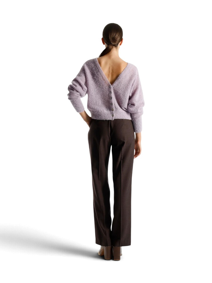 Paarse gilet met knopen Puzzle Julia June