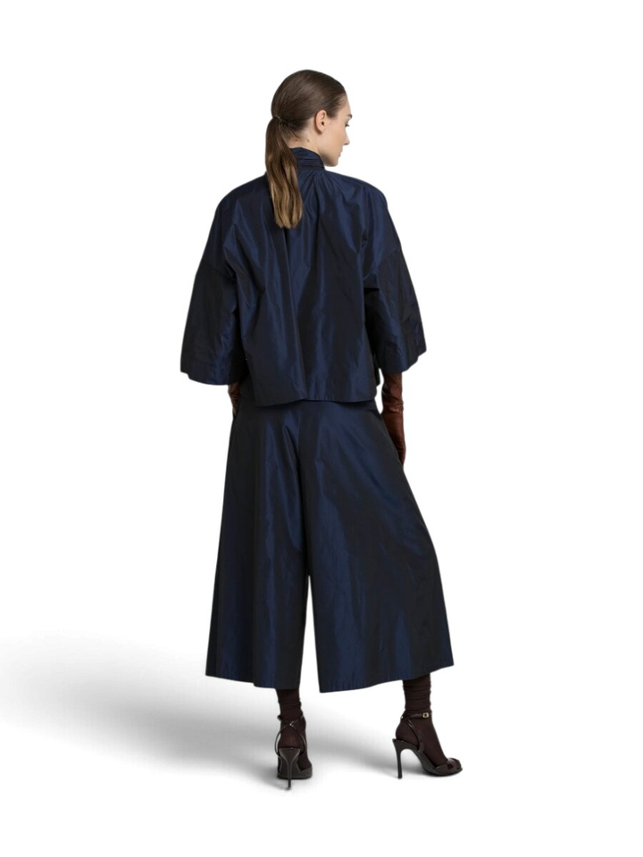 Donkerblauwe glanzende broek met bandplooi Timo Gigue 