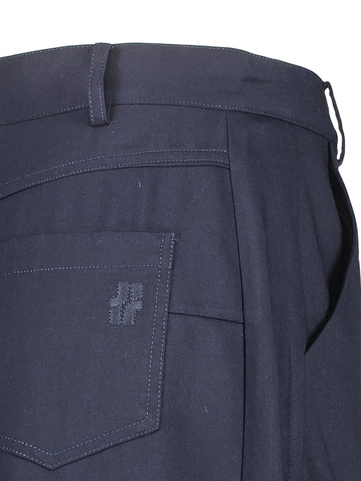Blauwe wijde broek asymmetrische sluiting Harrison JIJI Studio