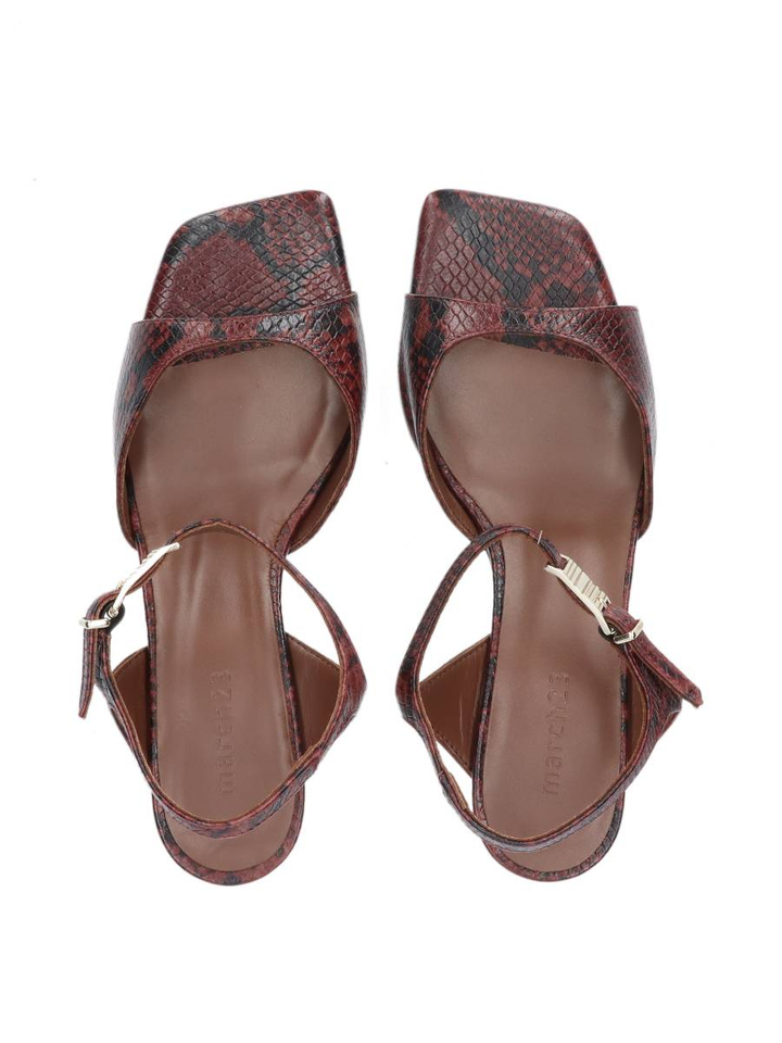 Rust python slingback Rebbec March 23