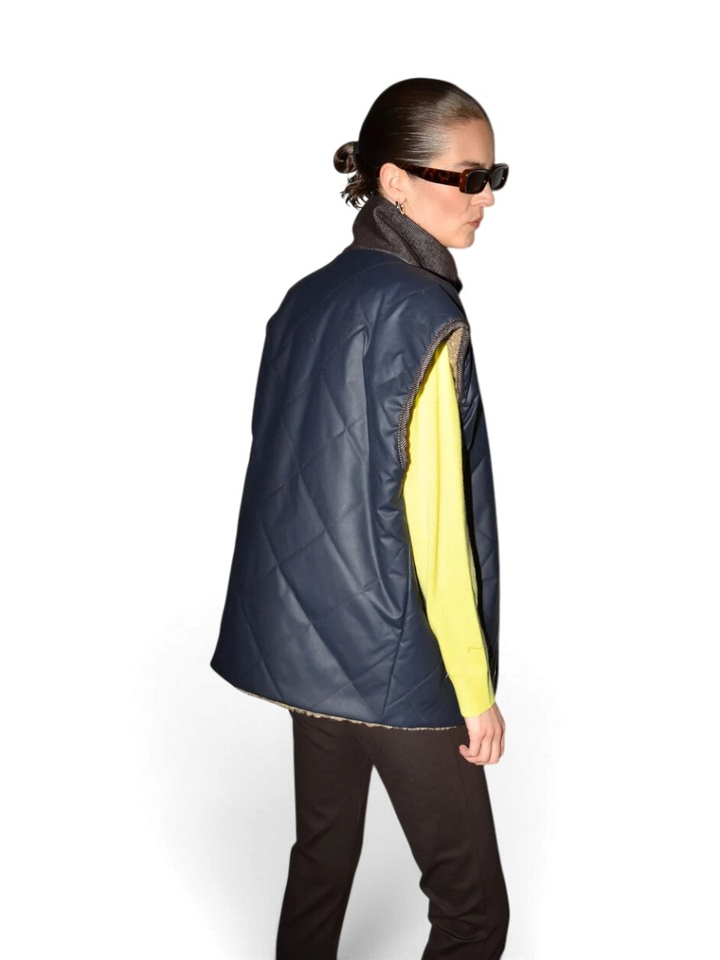 Blauwe bodywarmer met teddy Justa Collectors Club