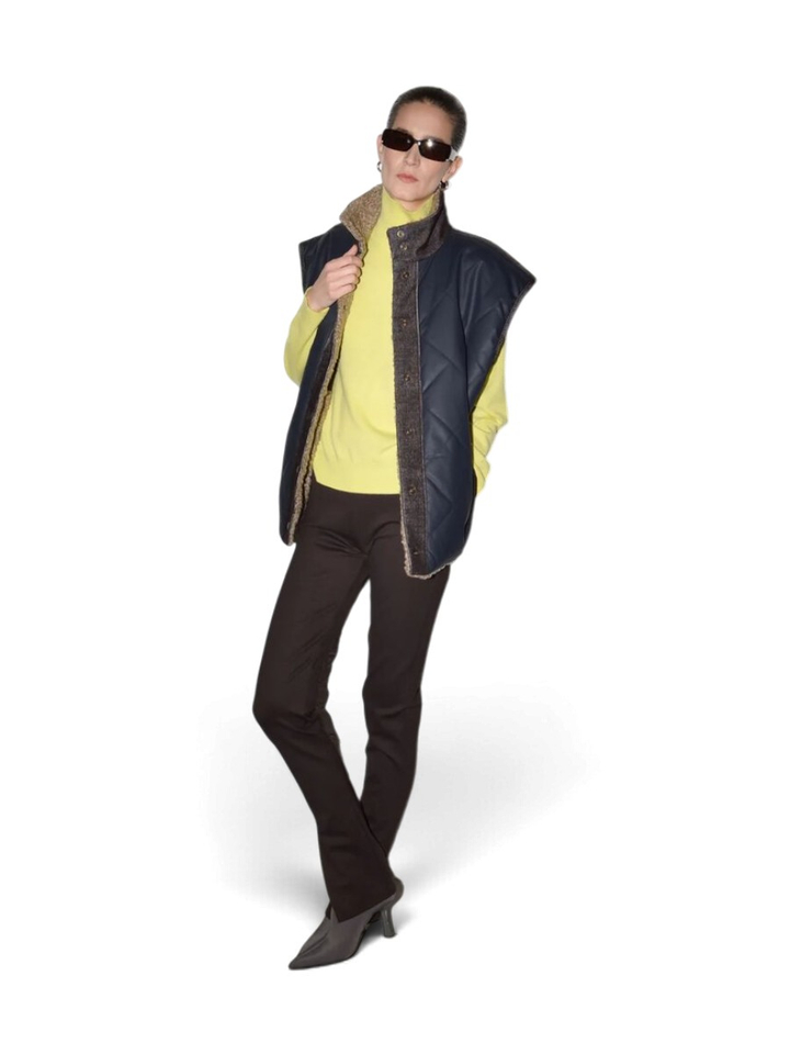 Blauwe bodywarmer met teddy Justa Collectors Club