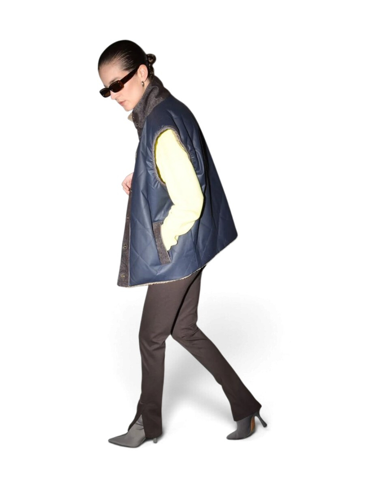 Blauwe bodywarmer met teddy Justa Collectors Club