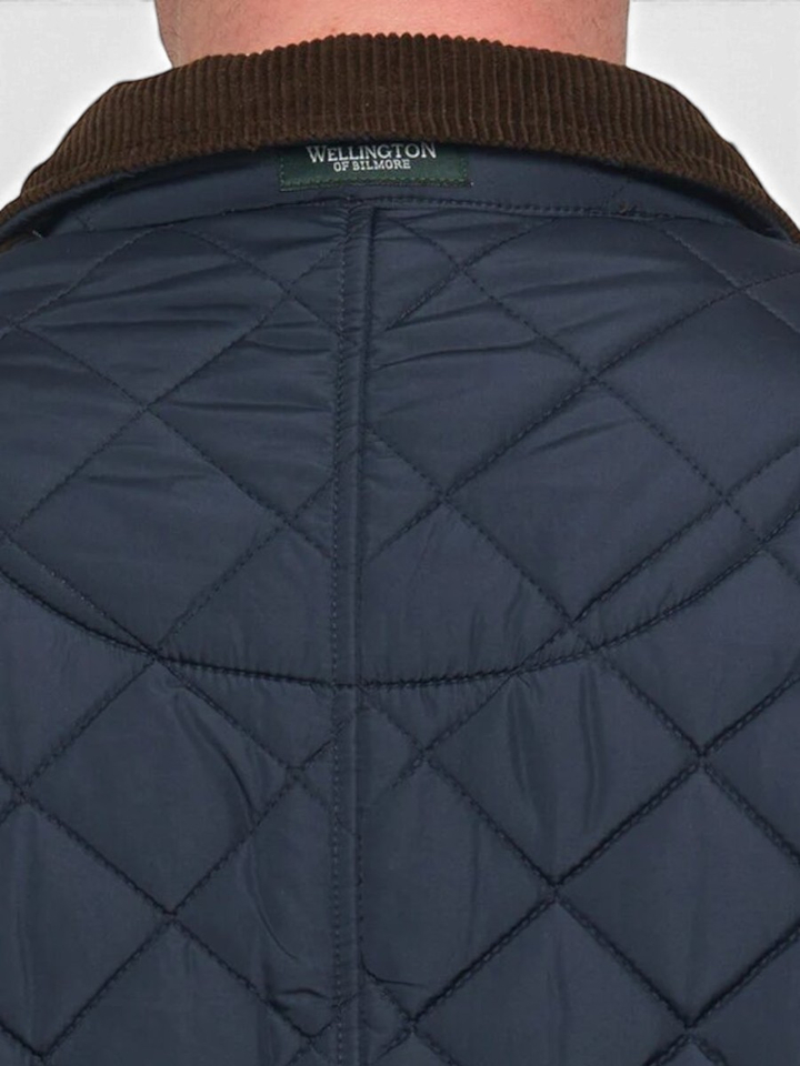 Blauwe padded jas met ribfluwelen kraag Boston Wellington