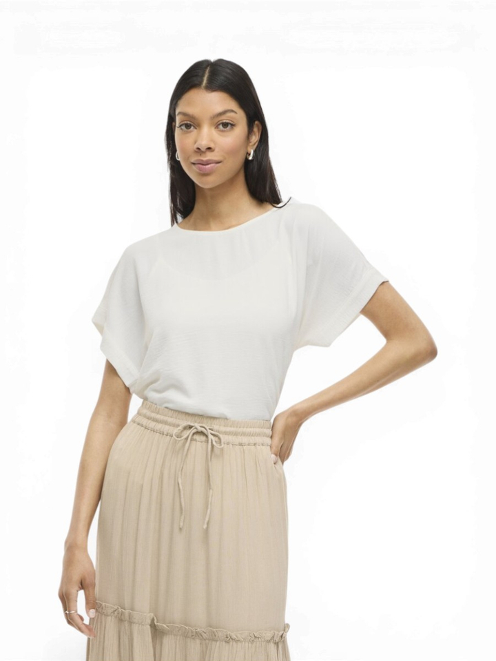 Witte bloes Vijosa Vila 