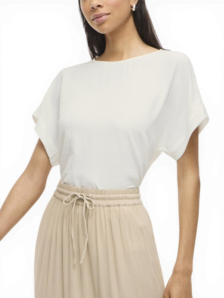 Witte bloes Vijosa Vila 