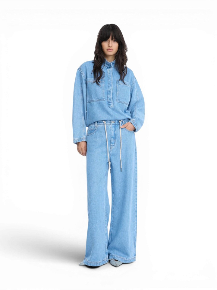 Lichtblauwe losvallende wijde broek in jeanslook Obey Munthe 