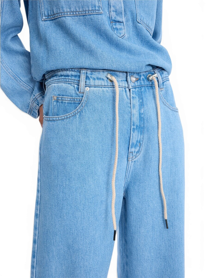 Lichtblauwe losvallende wijde broek in jeanslook Obey Munthe 