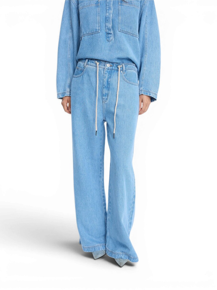 Lichtblauwe losvallende wijde broek in jeanslook Obey Munthe 