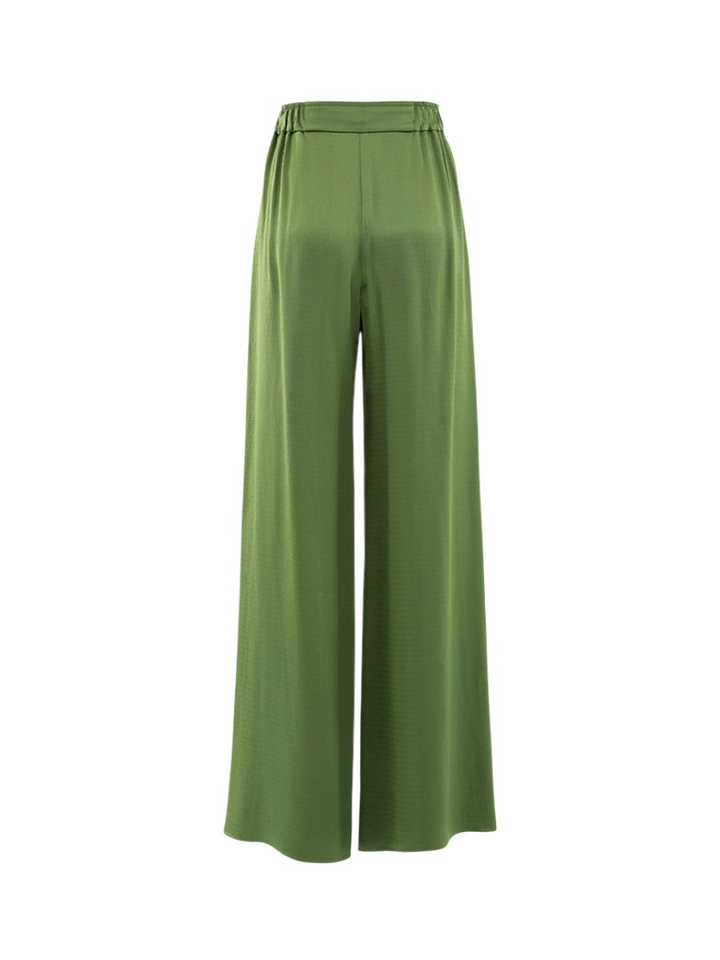 Smaragdgroene glanzende losvallende broek Dusty Natan