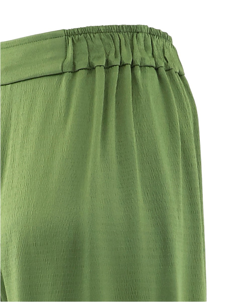 Smaragdgroene glanzende losvallende broek Dusty Natan