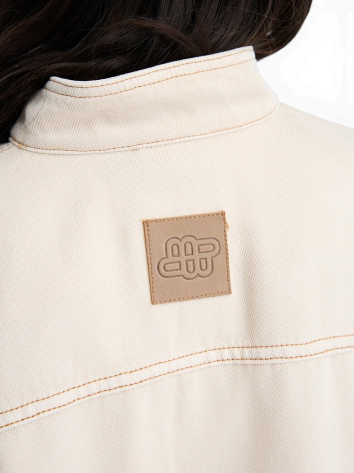 Beige soepelvallende jeans bloes Tuxa Munthe