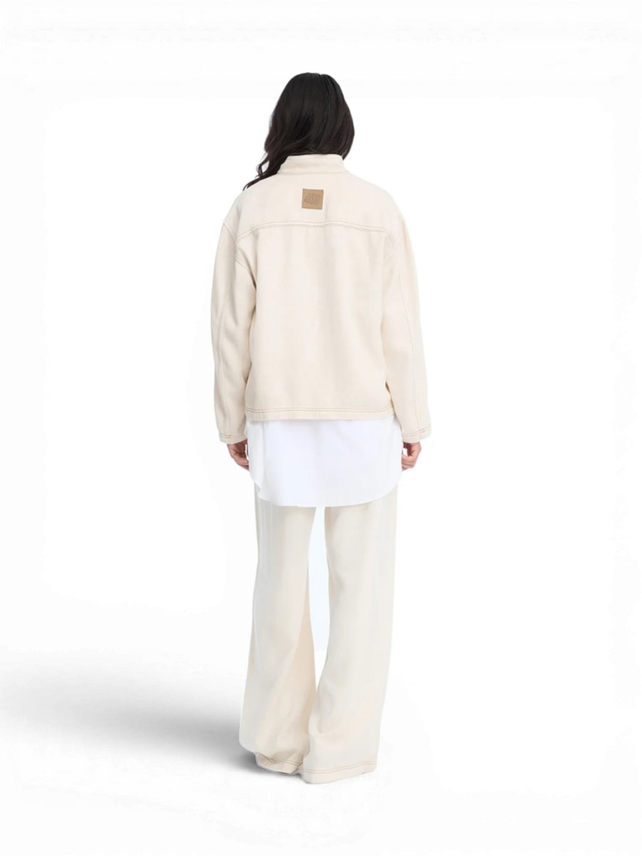 Beige soepelvallende jeans bloes Tuxa Munthe