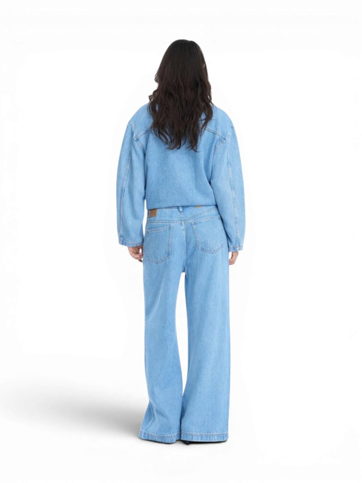 Lichtblauwe losvallende wijde broek in jeanslook Obey Munthe 