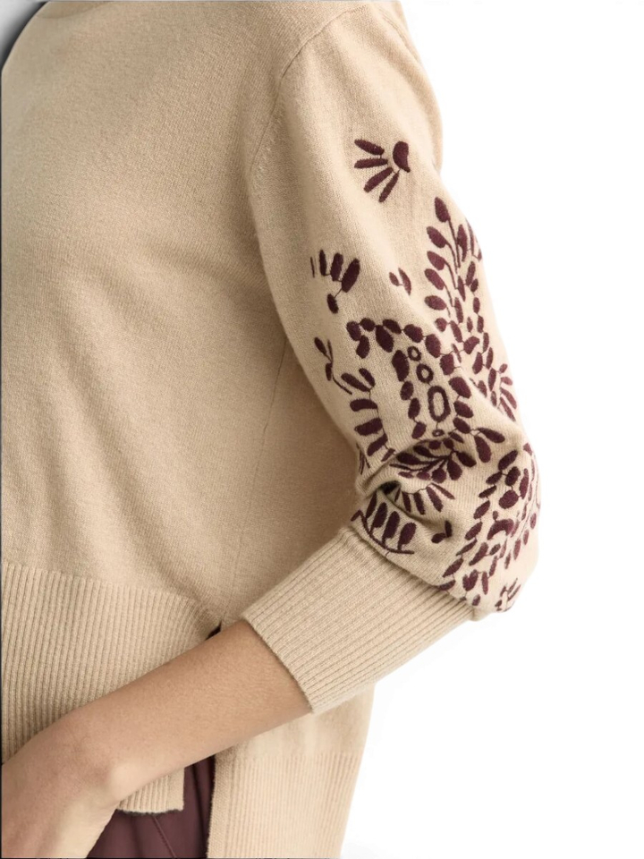 Beige wollen trui met print op mouw Arnes Xandres 
