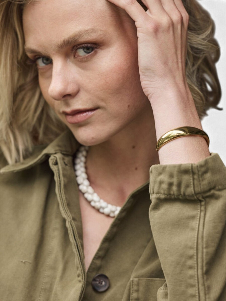 Gouden armband met swirl Ellen Beekmans