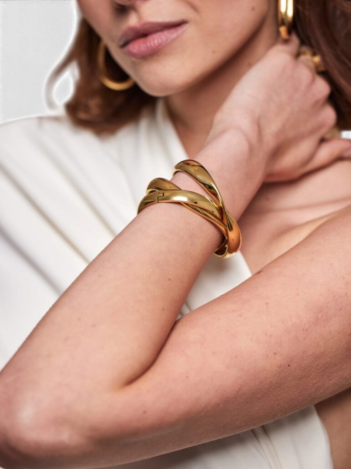 Gouden armband met swirl Ellen Beekmans