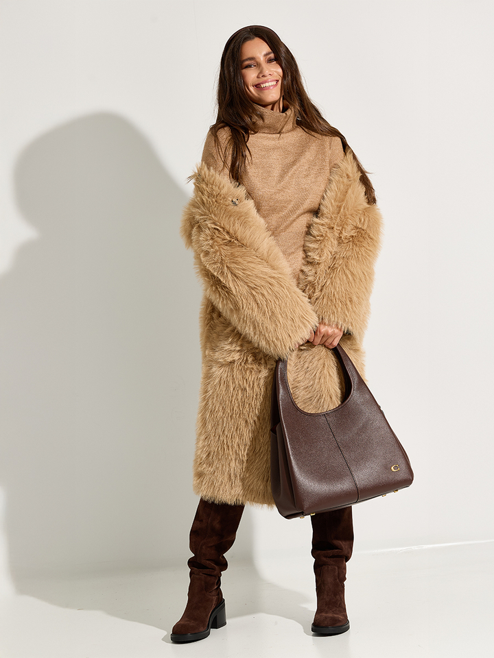 Dames shop the look van Kocca, Coach, Urbancode en Rotue Winter 2025 shoot 2