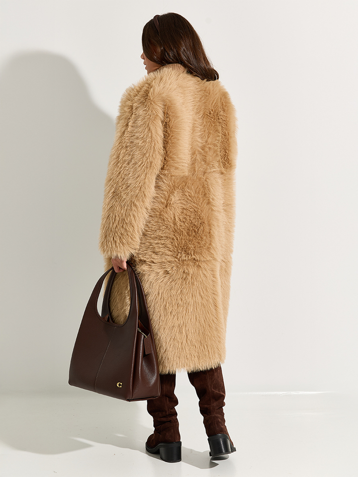 Dames shop the look van Kocca, Coach, Urbancode en Rotue Winter 2025 shoot 2