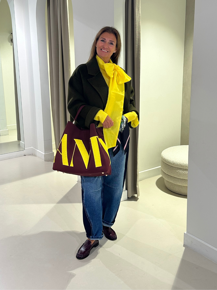 Dames | shop the look van Essentiel en Odare | Winter '26 | Deleye Creators FW26